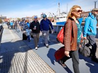 1008280152 ma nb NantucketFerry  Passengers make their way to board the maiden voyage of the Seastreak Whaling City Express ferry service from New Bedford's State Pier to Nantucket.   PETER PEREIRA/THE STANDARD-TIMES/SCMG : ferry, waterfront, voyage, trip, harbor
